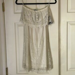 Express mini dress. Slight peek a boo back. New with tags.